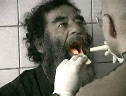 Saddam "Just say Ahhh.."